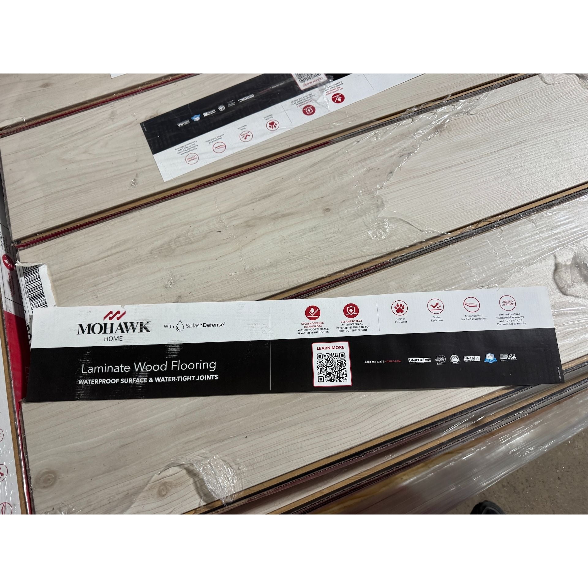 Mohawk Home Laminate Flooring With SplashDefense & CleanProtect 10mm + 2mm Pad AC4 17.18 Sq. Ft./Carton Natural Bevel EIR Emboss