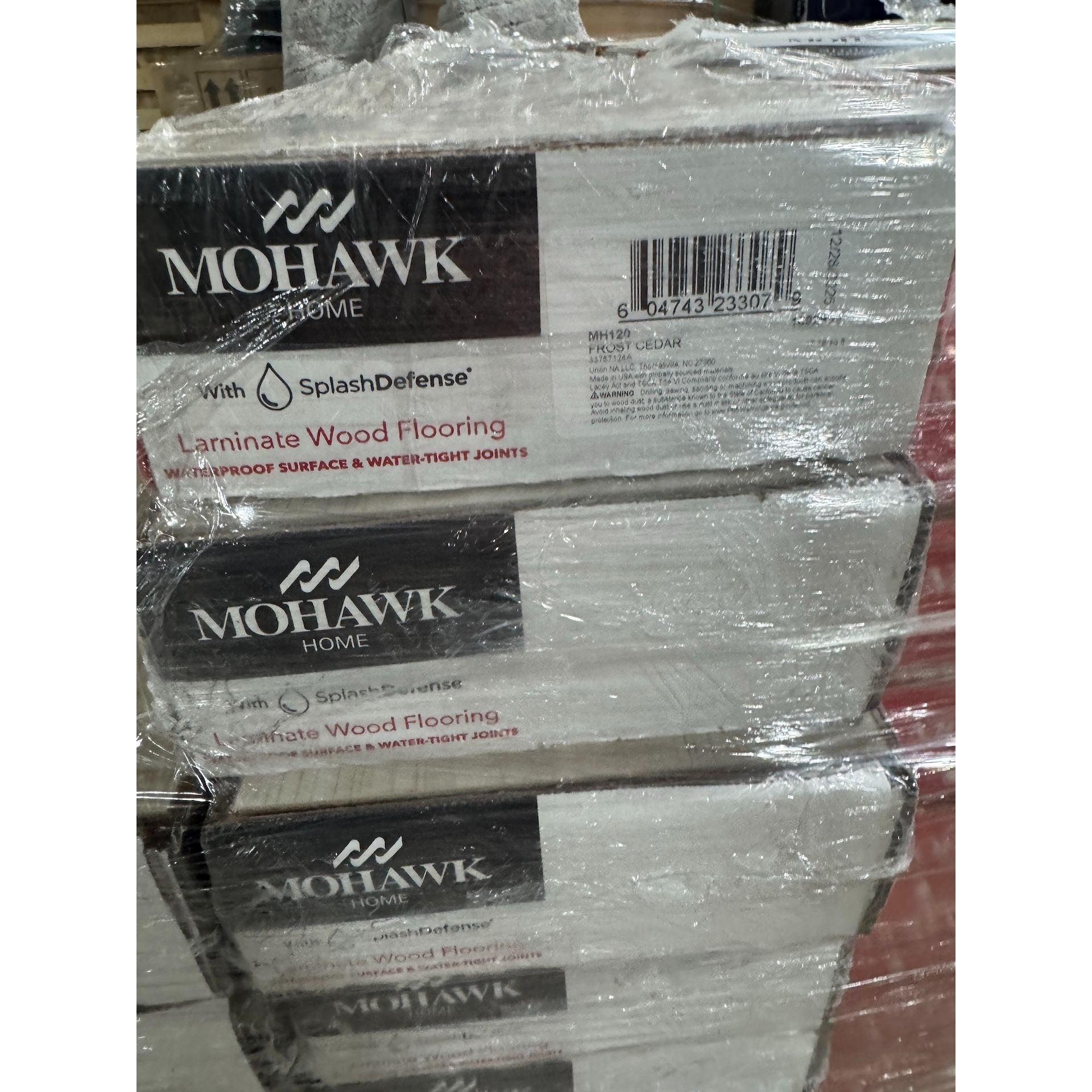 Mohawk Home Laminate Flooring With SplashDefense & CleanProtect 10mm + 2mm Pad AC4 17.18 Sq. Ft./Carton Natural Bevel EIR Emboss