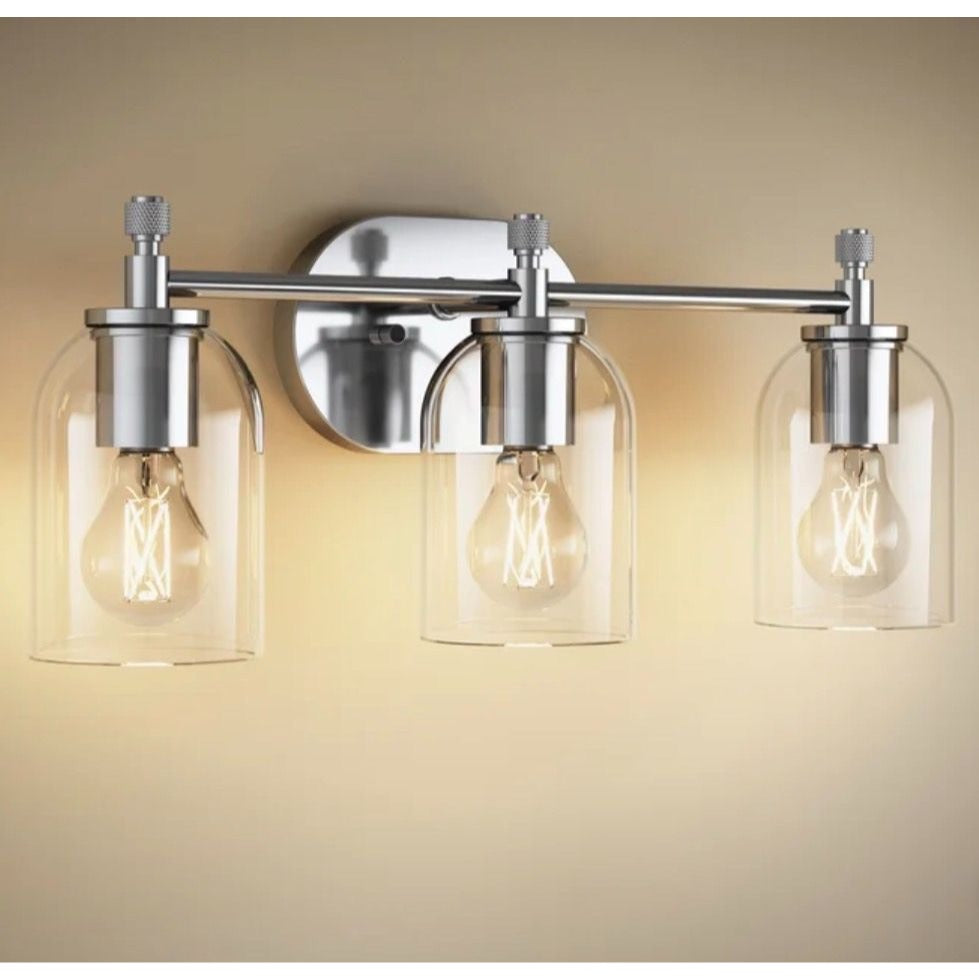 Orime Three-Light Bathroom Vanity Light With Clear Glass Dome Shades